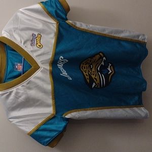 NFL REVERSIBLE JAGUARS  YOUTH MEDIUM SHORT SLEEVE SHIRT.  PERFECT CONDITION.